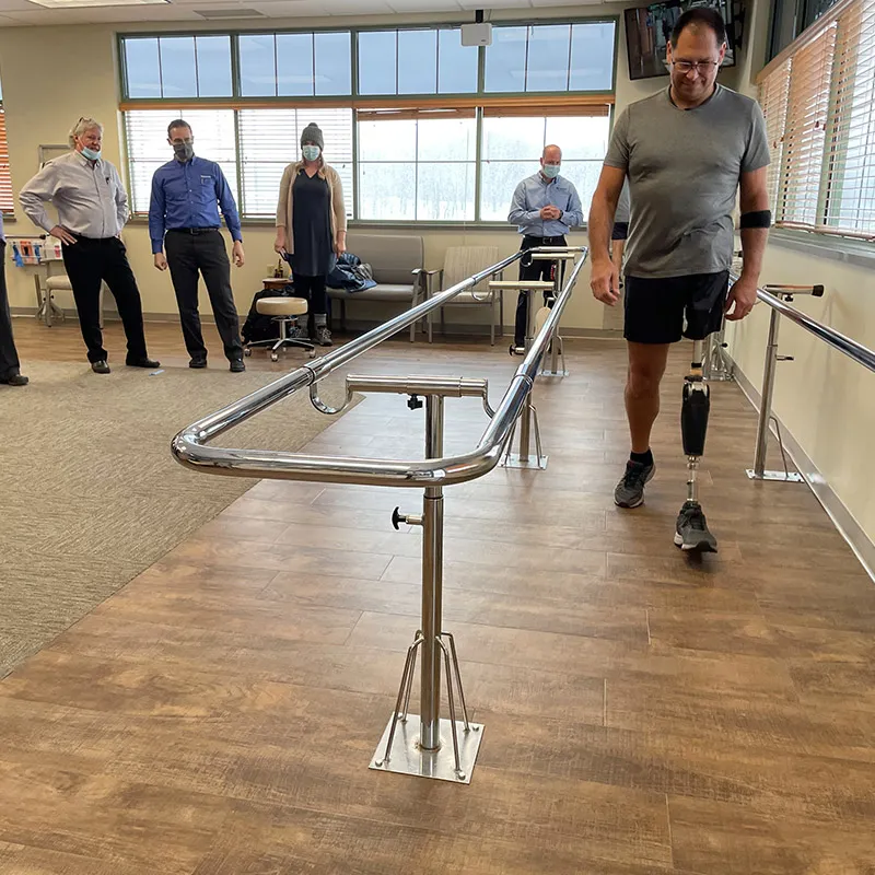 Person Walking With Prosthetic Leg